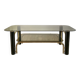 coffee table in smoked glass and black and gold metal from the 70s