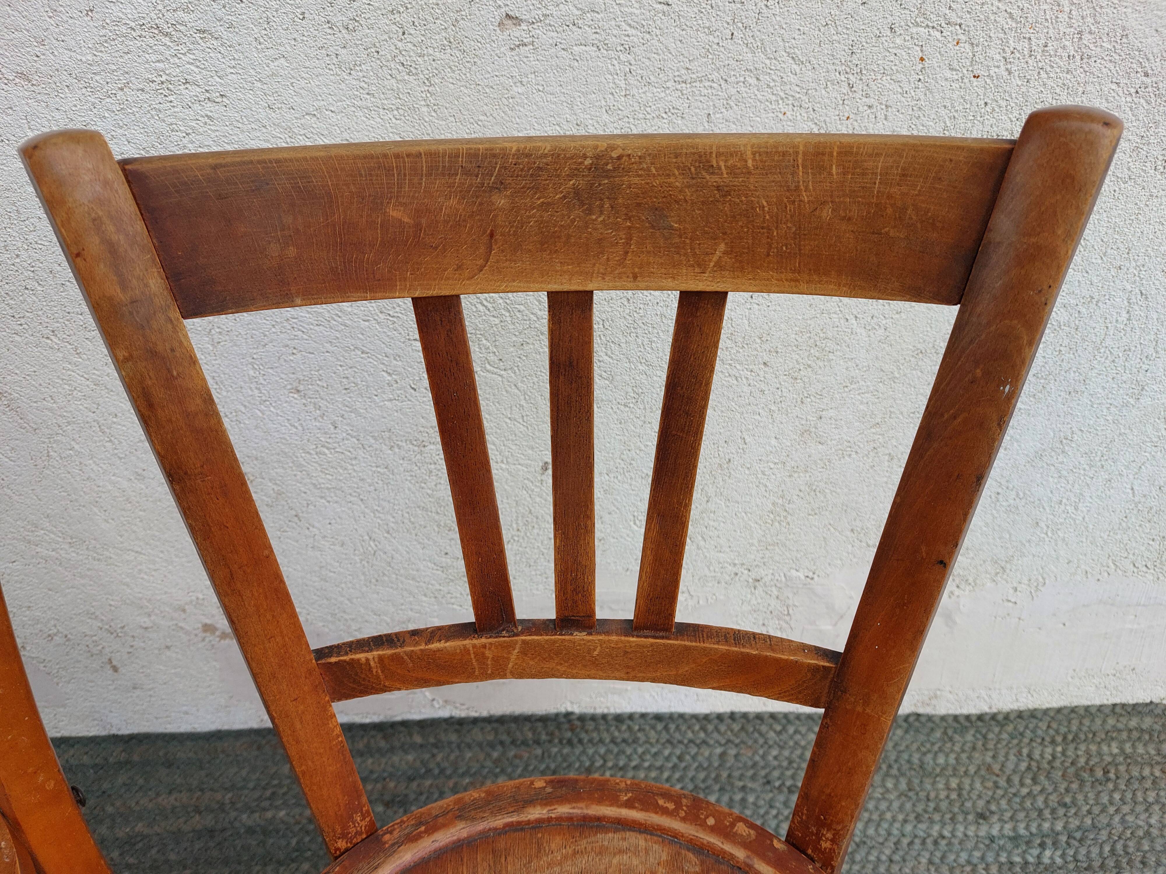 3 wooden bistro chairs