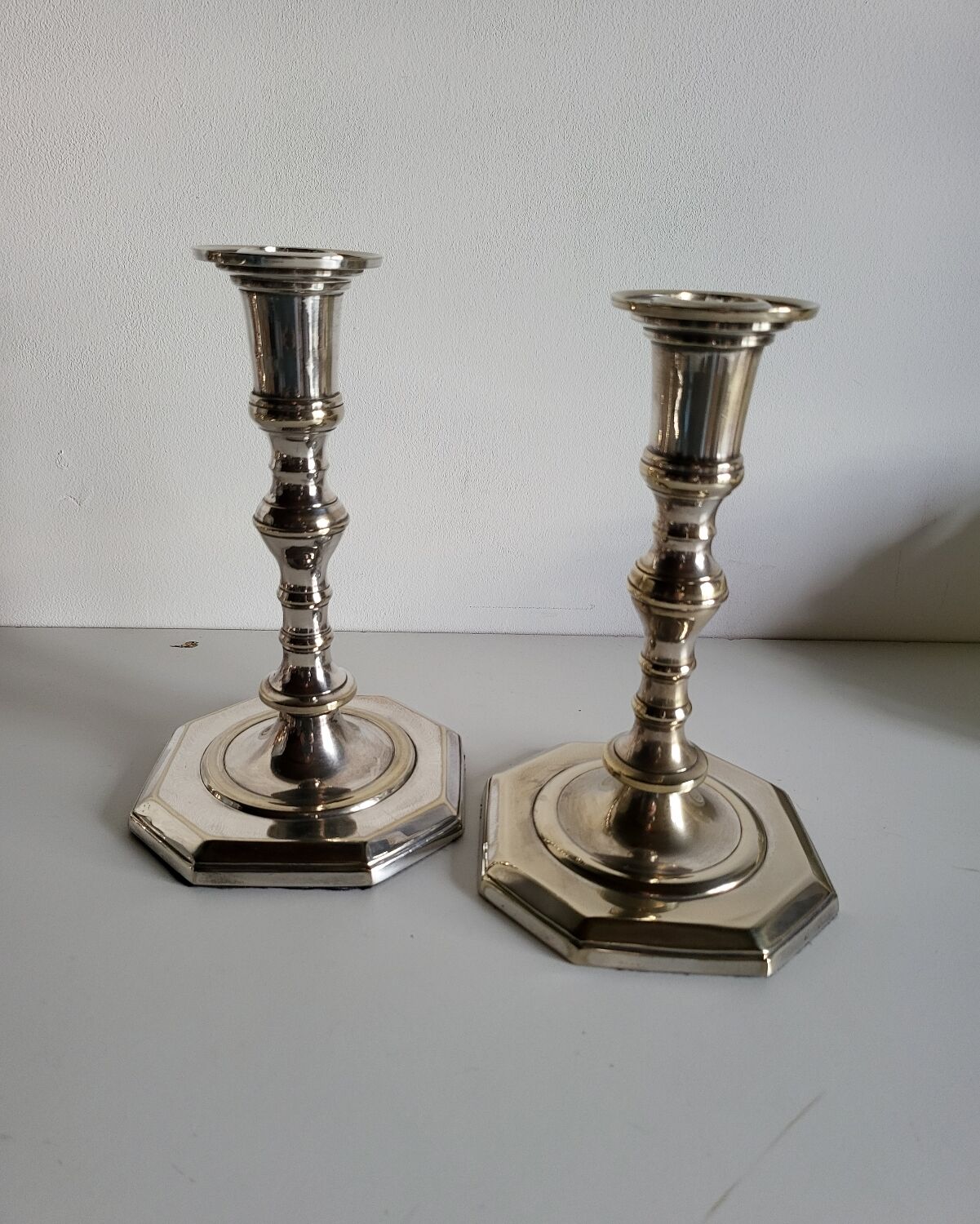 Pair of silver-plated candlesticks