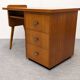 Modernist desk in blonde rosewood, France circa 1960.