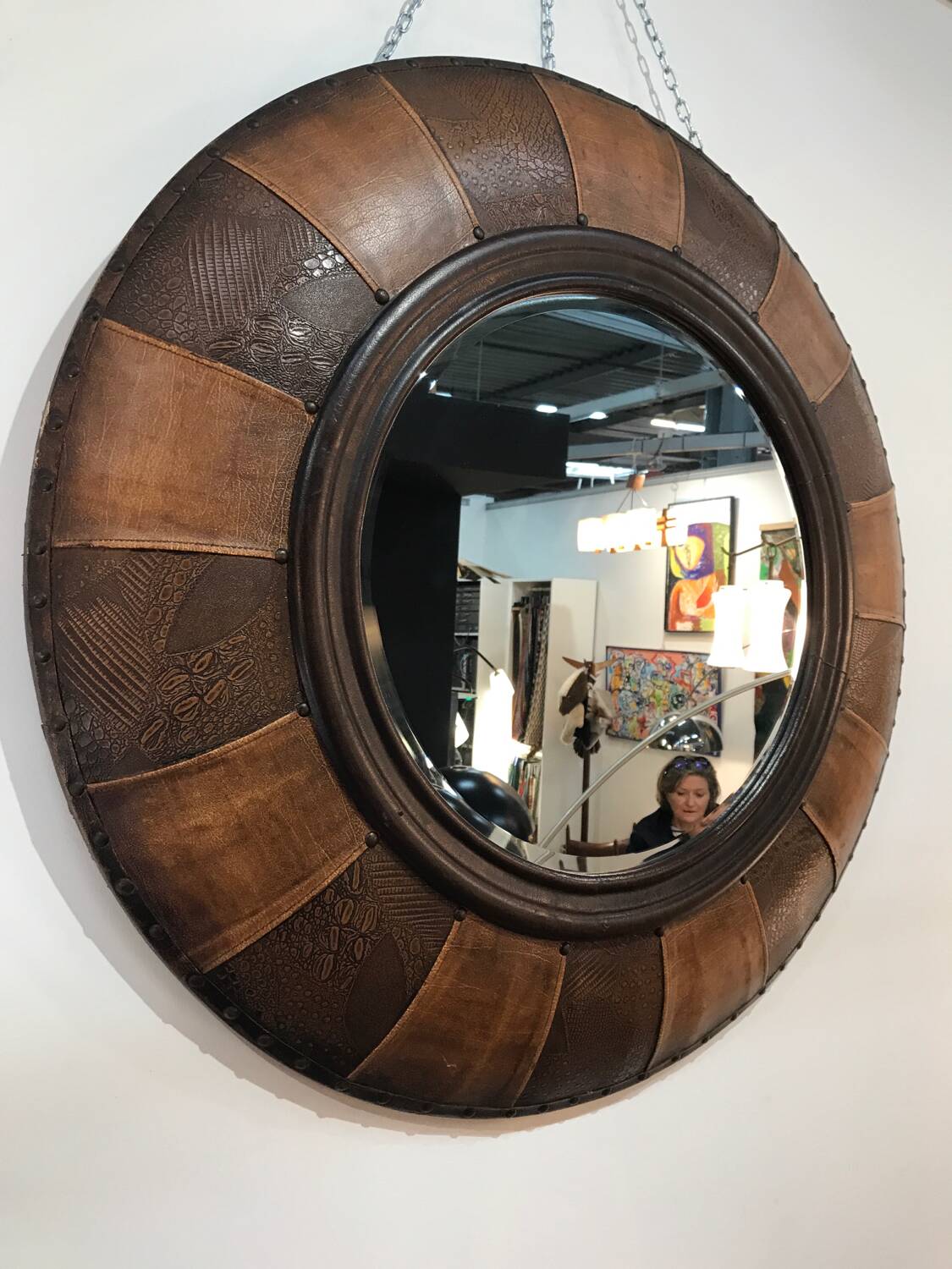 Large round leather mirror