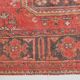 Tapis couloir vintage corail et beige aux motifs orientaux adoucis