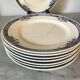 Lot de 8 assiettes Longchamp Lily, terre de fer