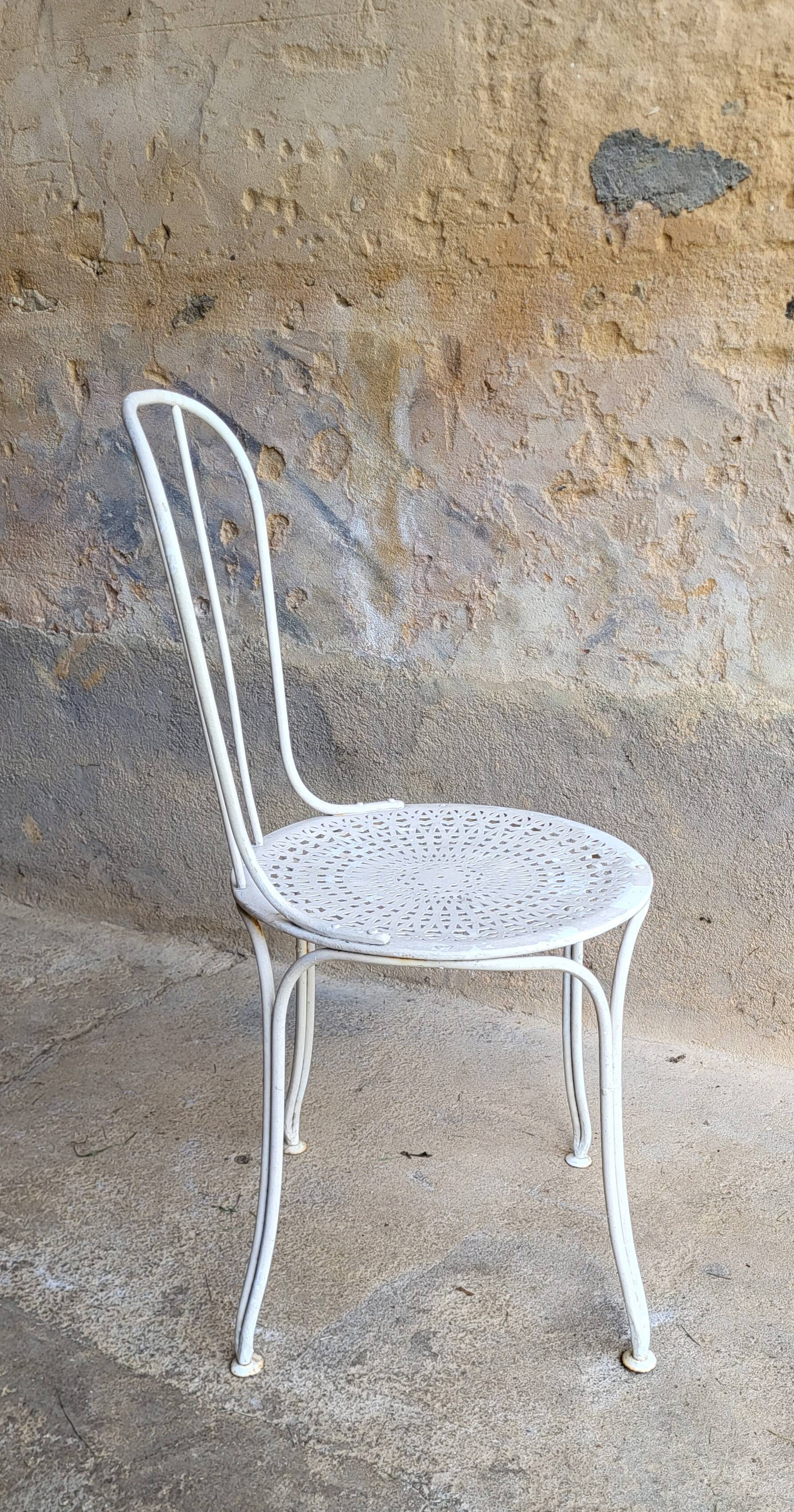 Pair of iron garden chairs