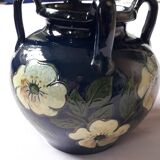 Antique Art Nouveau vase with a floral decoration.
