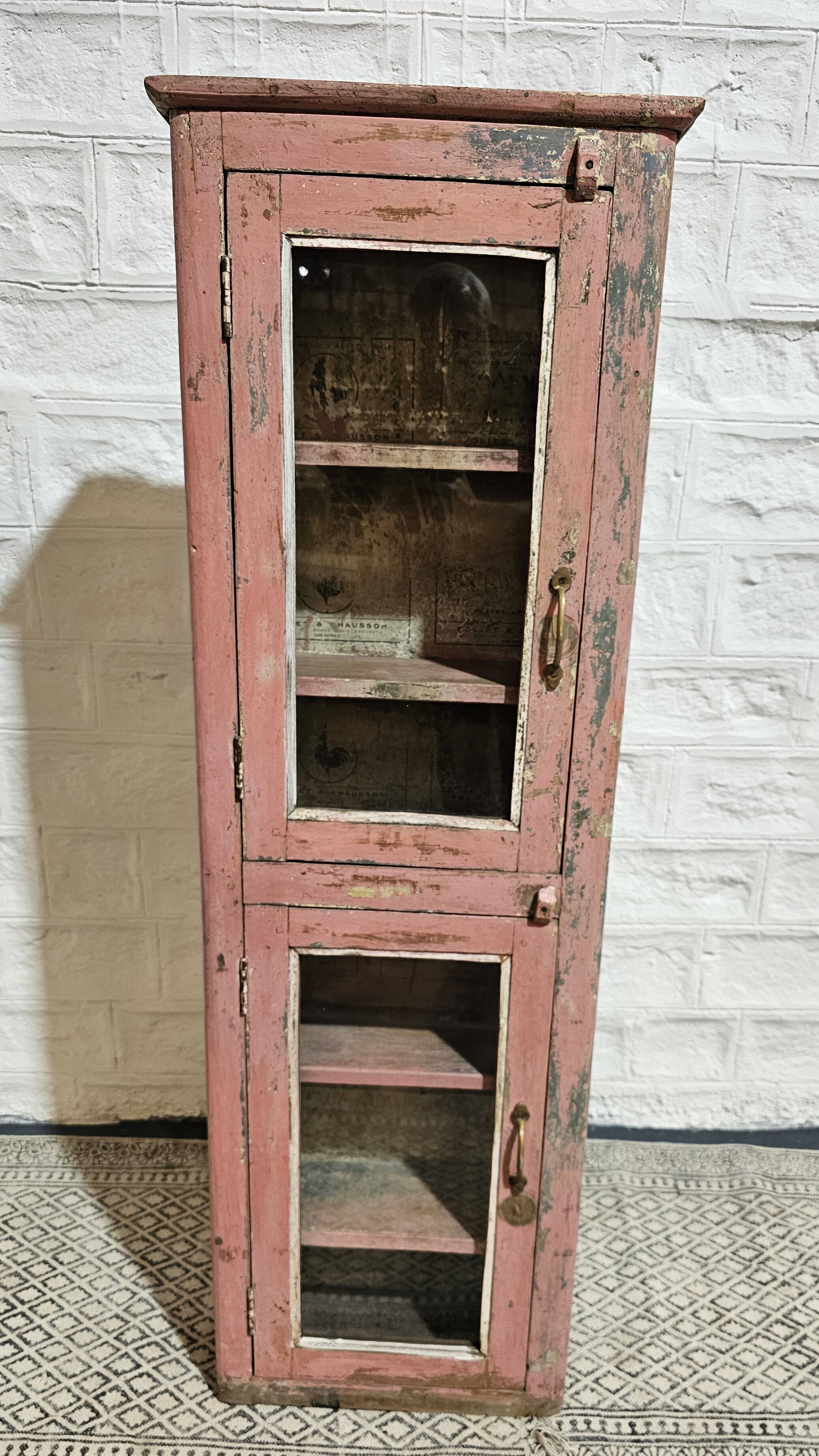 Pink showcase in Burmese teak