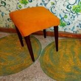 2 small yellow poufs