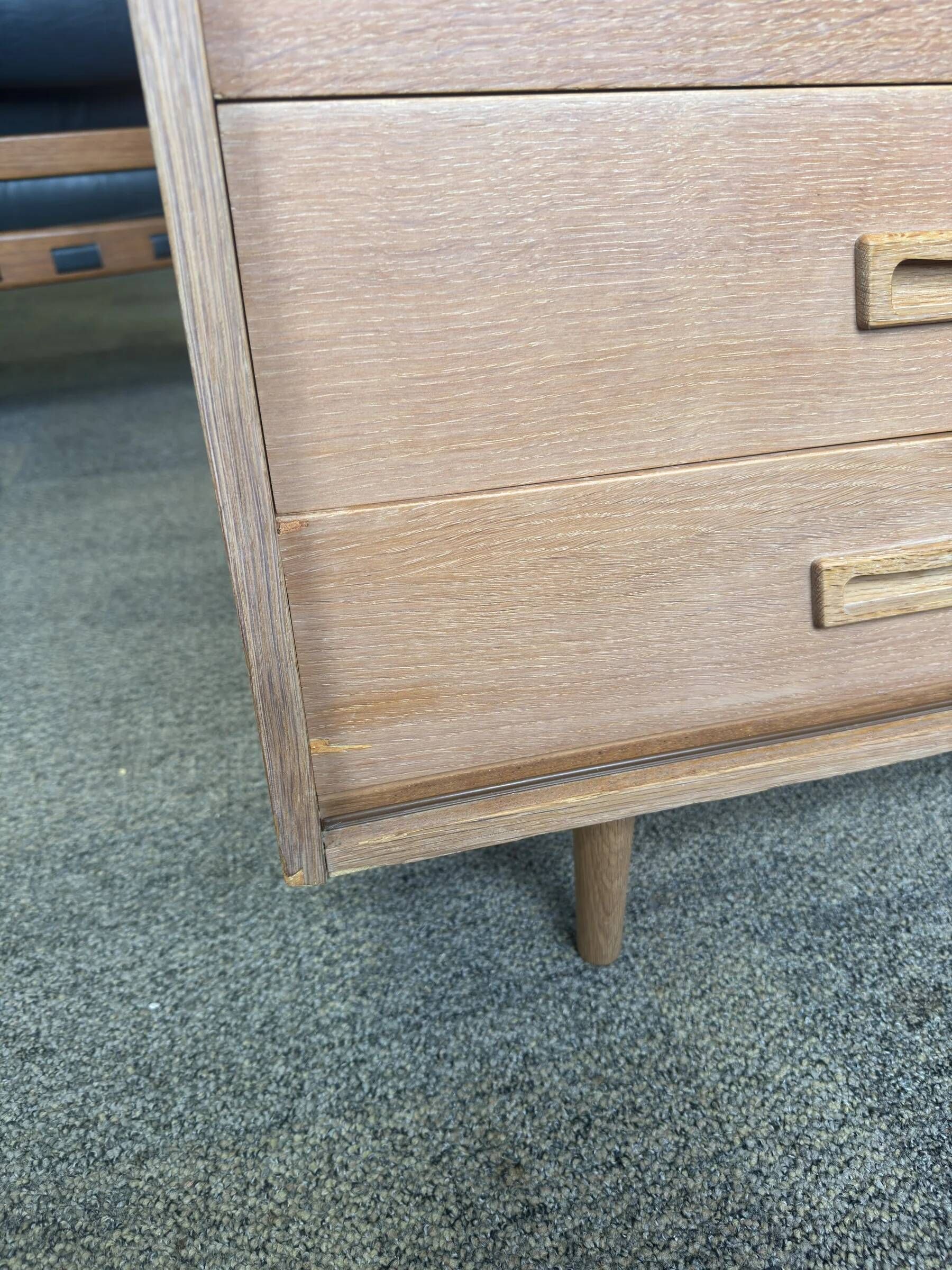 Danish buffet in light oak with sliding door and four drawers.