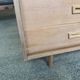 Danish buffet in light oak with sliding door and four drawers.