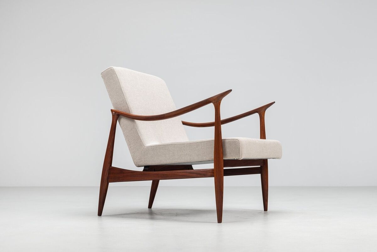 Sculptural Danish lounge chair in teak and fabric Denmark 1960
