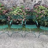 2 armchairs and 2 chairs in full wrought iron, handcrafted.