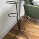 Wrought iron plant holders