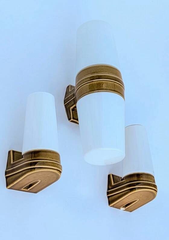3 ochre porcelain wall sconces from the 1960s (models 6065 and 6080) by Sigvard Bernadotte for Ifö.