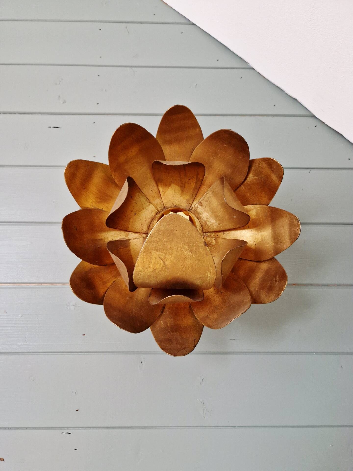 Gold metal floral wall light, 1960-70.