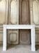 Louis XVI fireplace in white marble, 19th century.