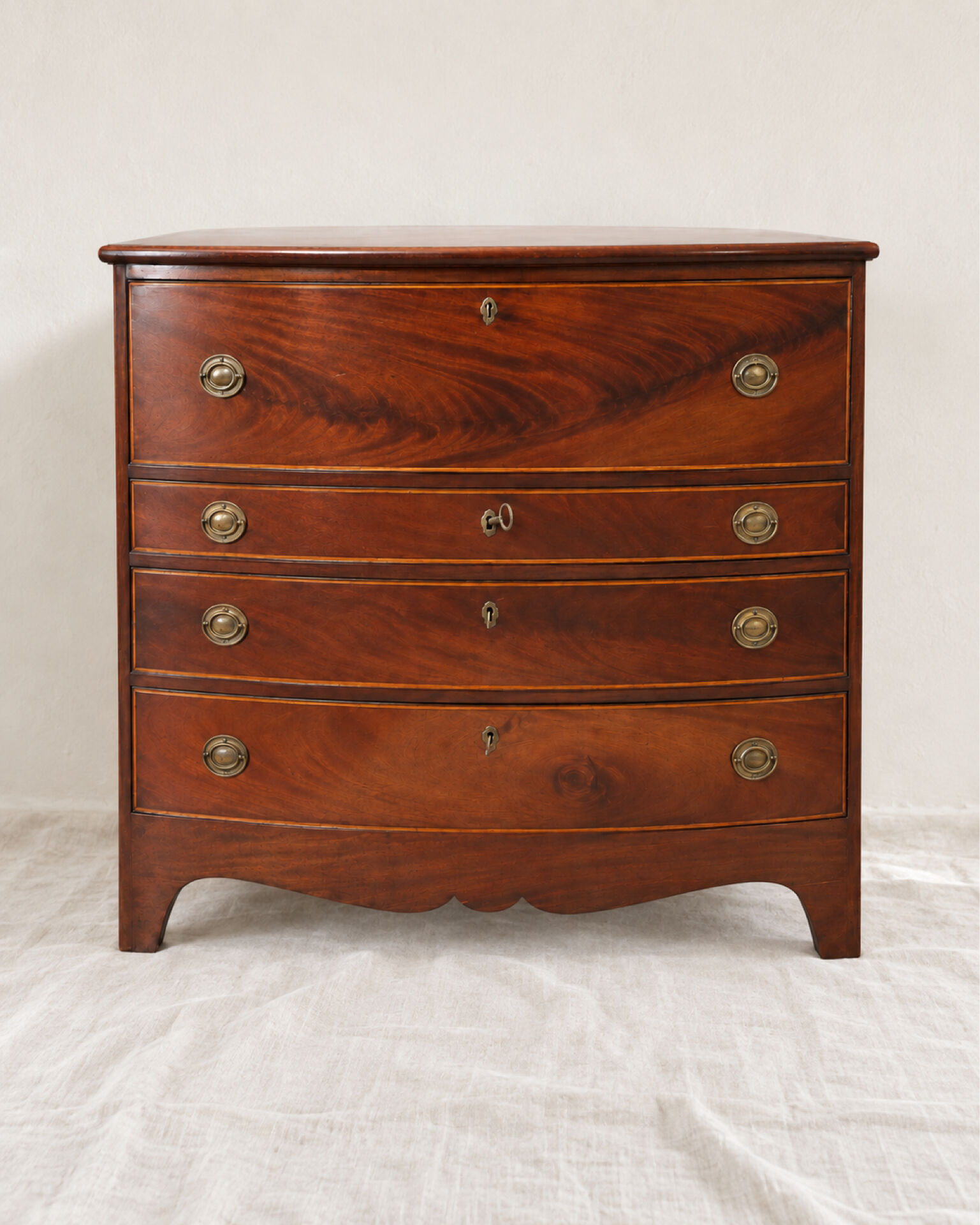 Flame mahogany drop-leaf writing desk, English style.