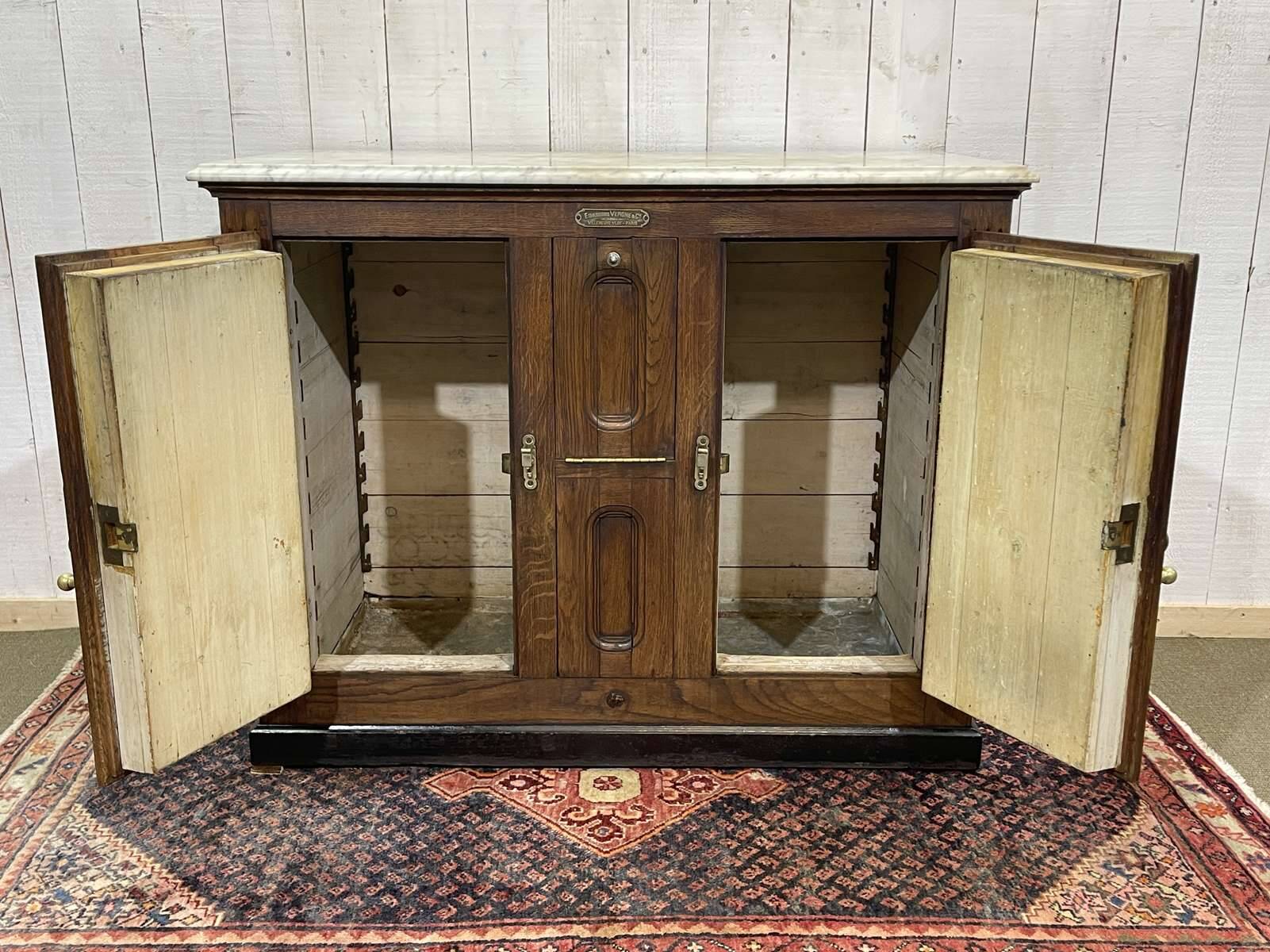 Glacière début XXème en chêne et dessus marbre