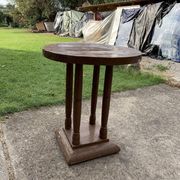 1930s Art Deco round side table in painted brown wood — column leg base