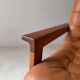 Vintage lounge chair in teak and leather from the 1960s.