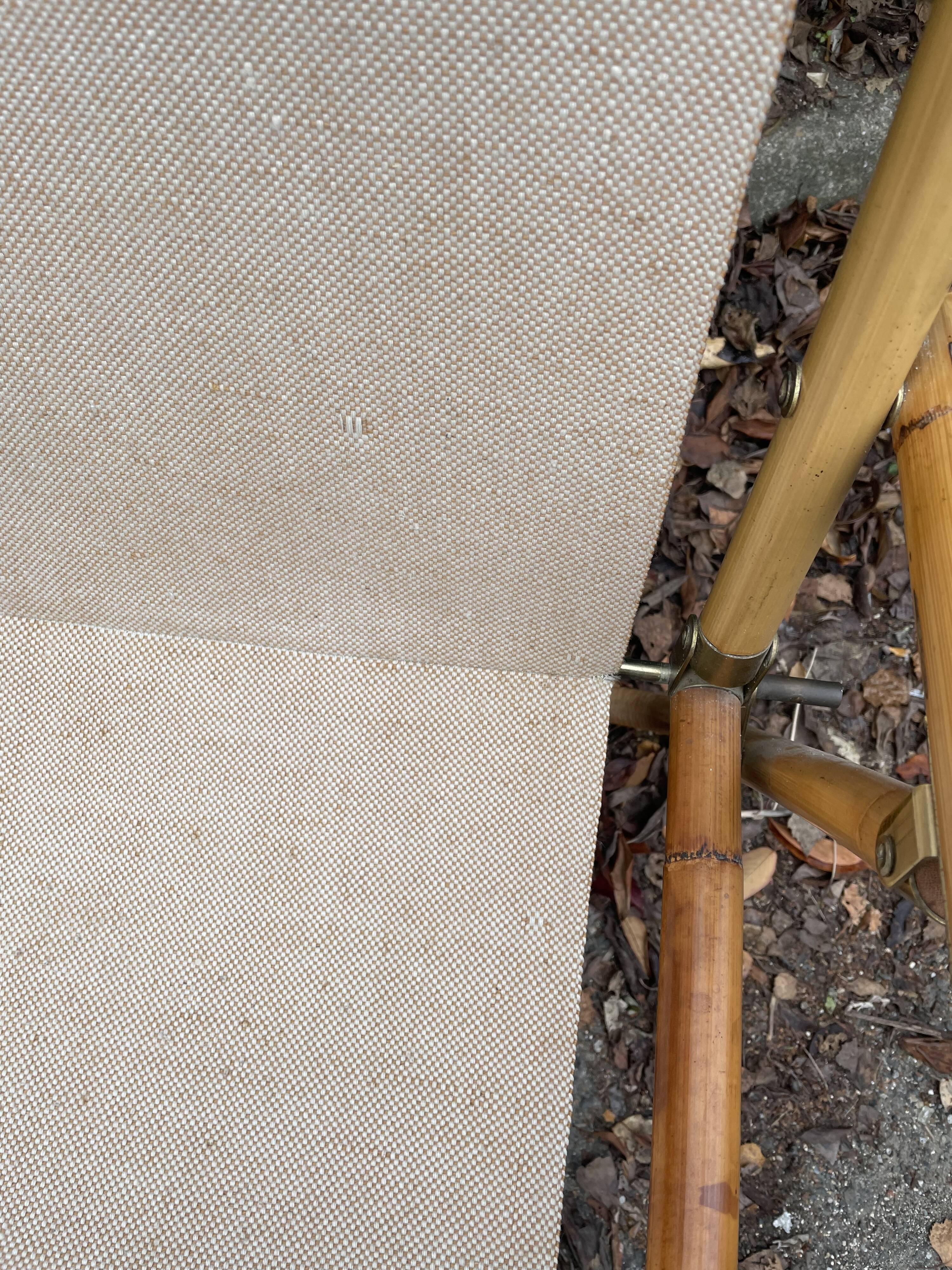 Rattan armchair and foldable canvas