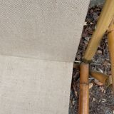 Rattan armchair and foldable canvas