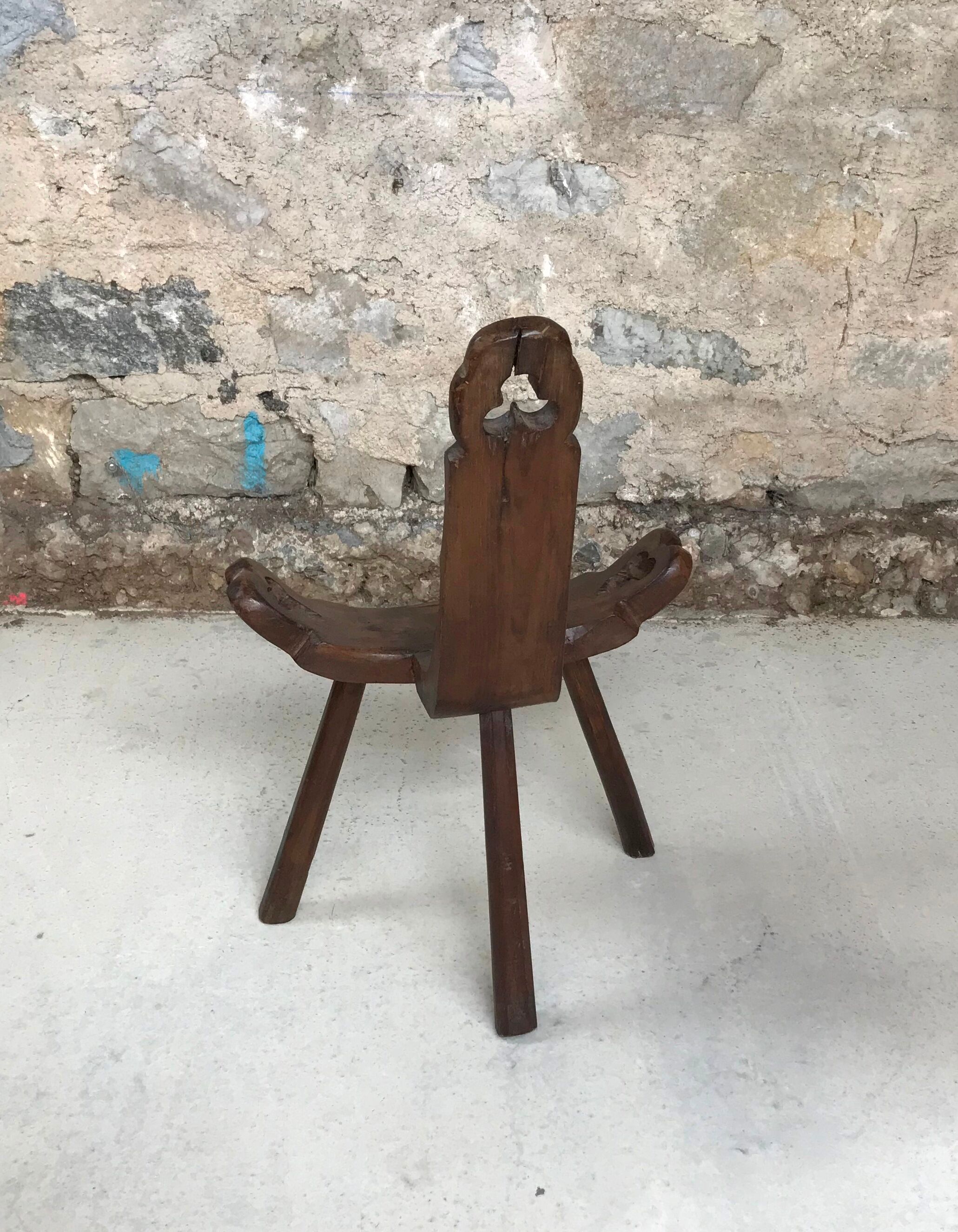 Tripod mountain chair carved wood brutalist 50s design
