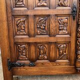 Spanish furniture with carved wood profiles and coats of arms from the 1950s.