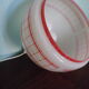 Space age pendant lamp, white opaline with orange silkscreened geometric designs