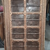 Old wooden door with frame
