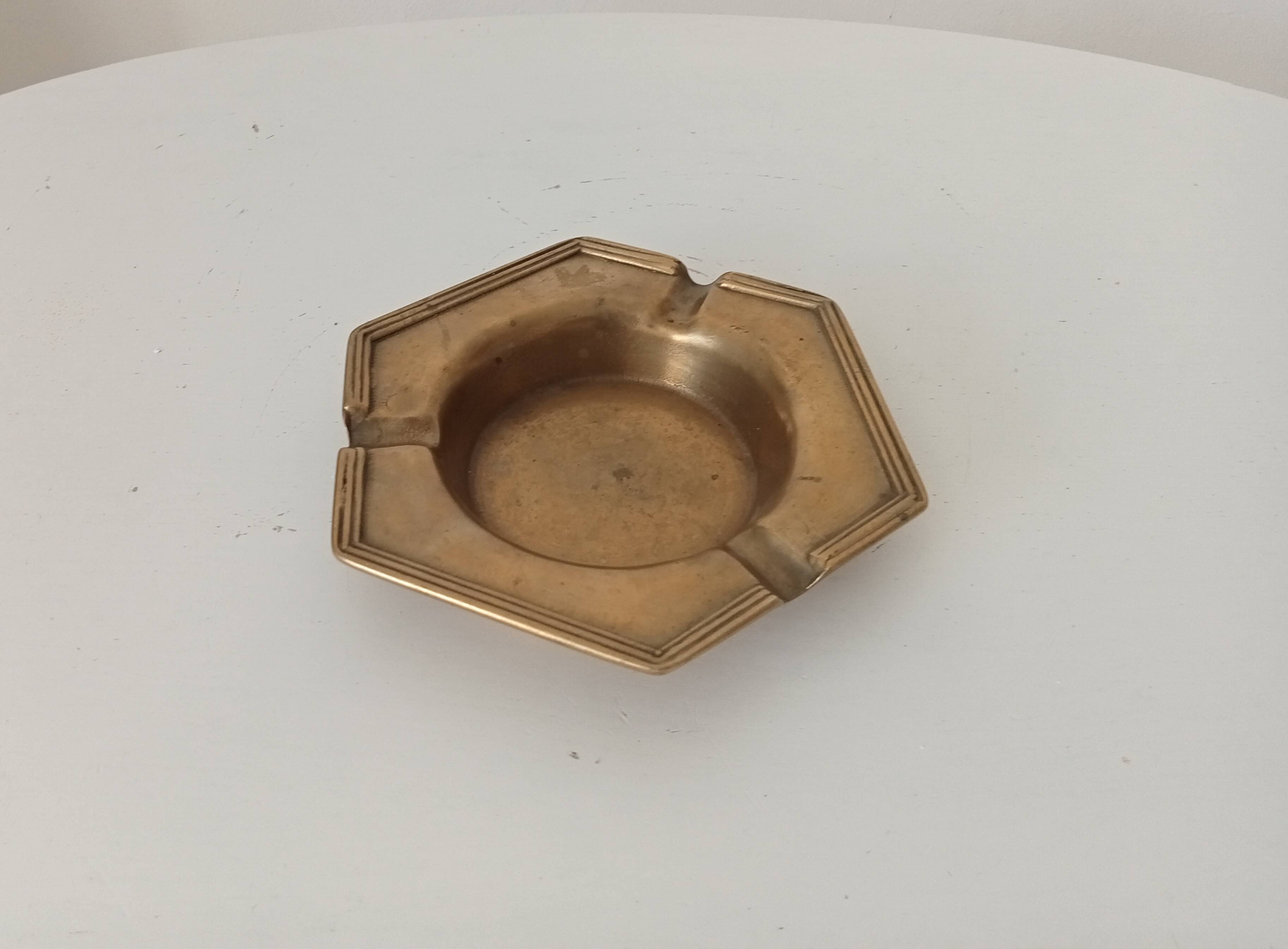 Antique ashtray in solid gilded brass