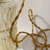Baladeuse vintage en verre ambré
