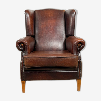 Dark brown vintage sheep leather wingback armchair