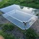 Coffee table in plexiglass and brass.
