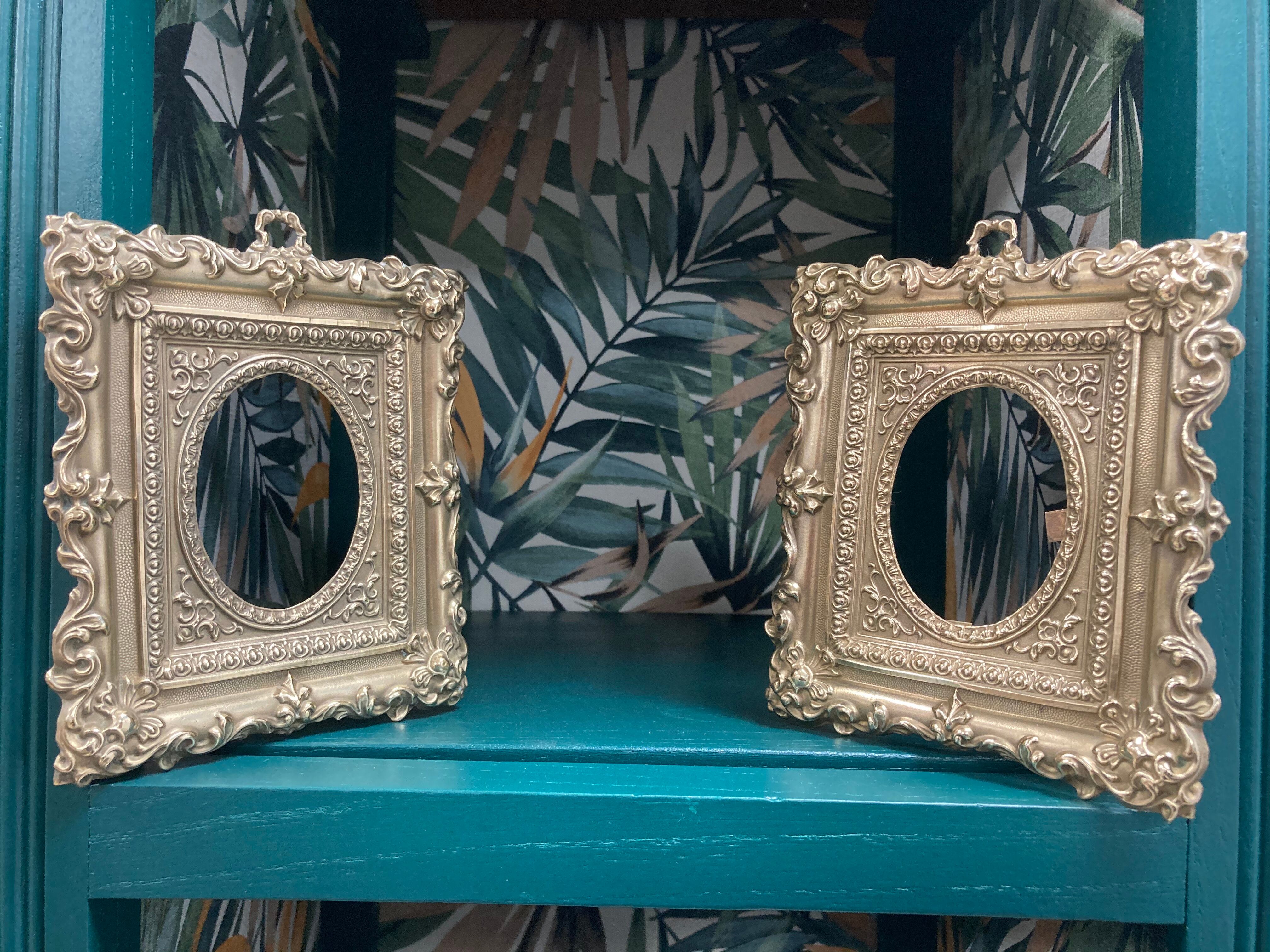 Pair of brass photo frames