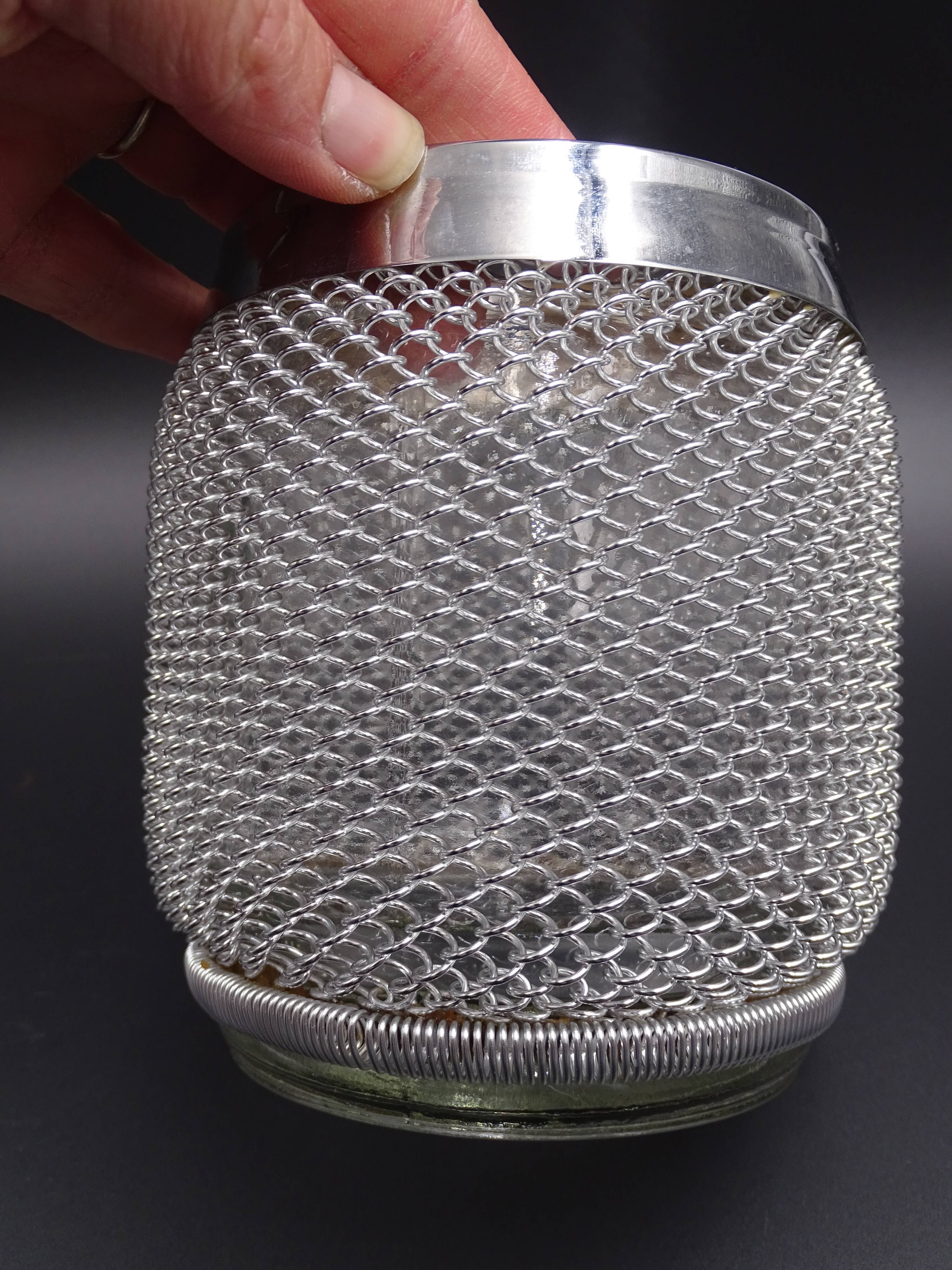 Screened ice bucket, circa 1970