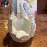 Swan pocket emptier