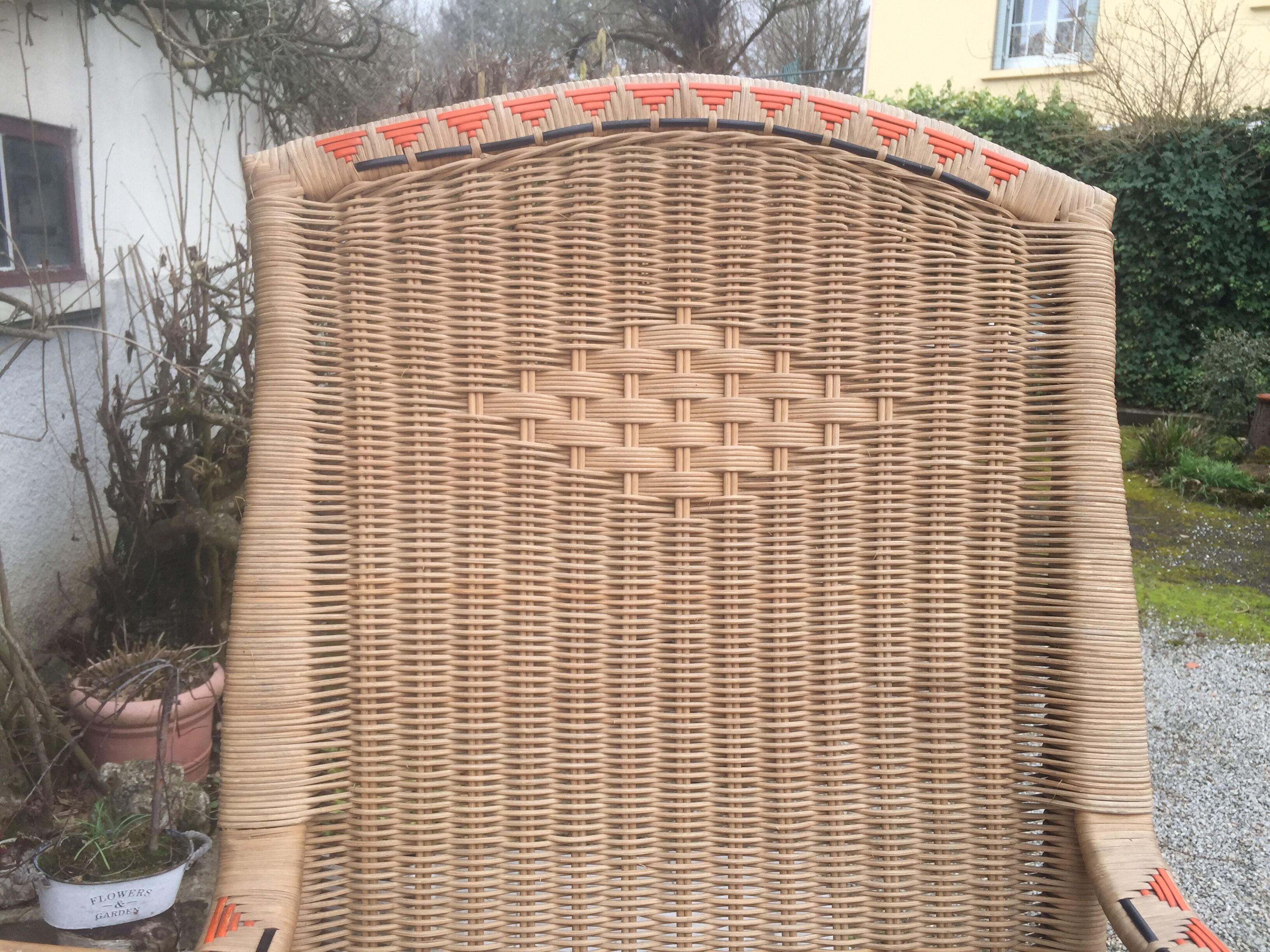 Red vintage décor rattan armchair