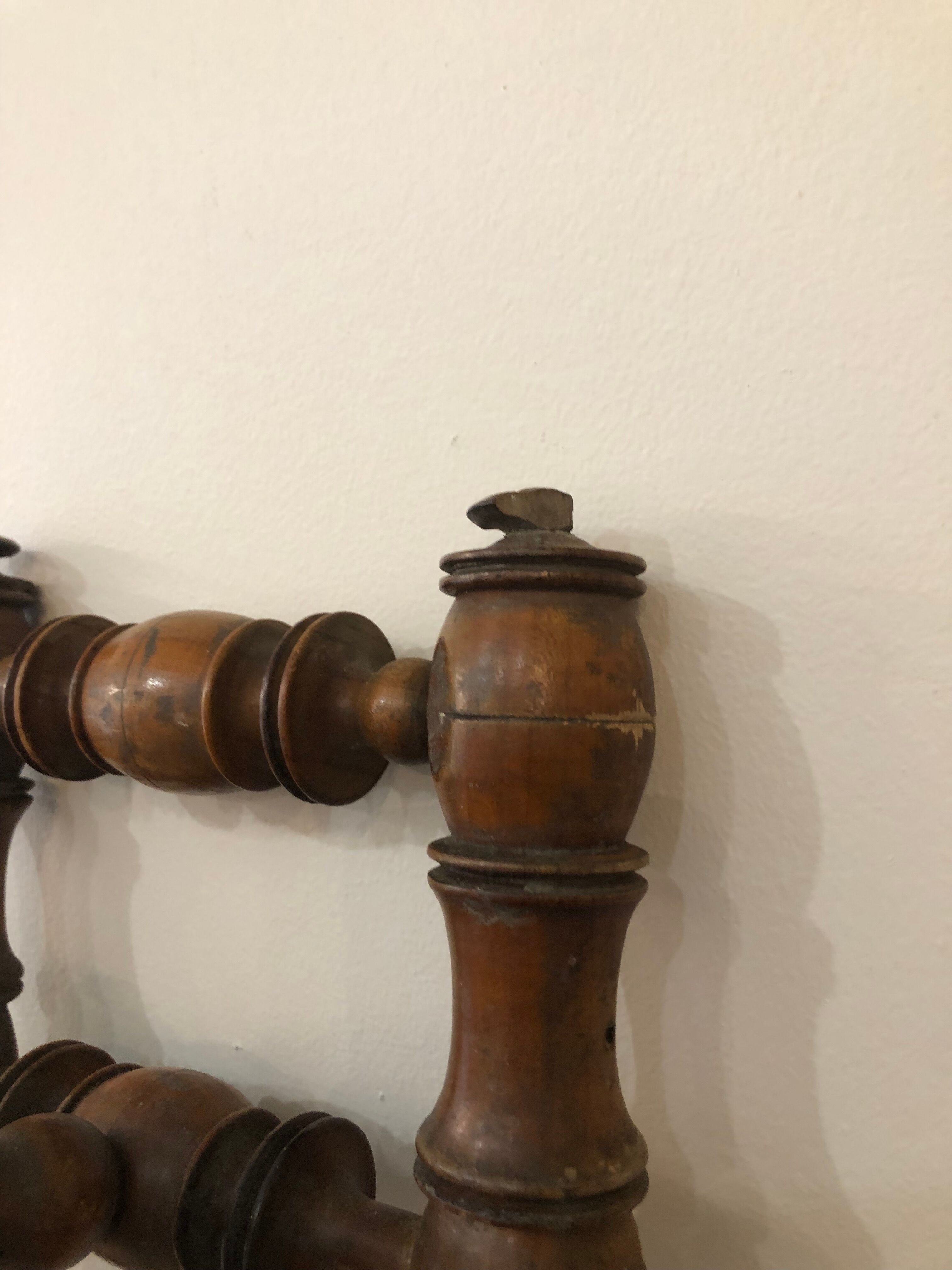 Wooden coat rack with swivel hooks