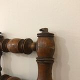 Wooden coat rack with swivel hooks