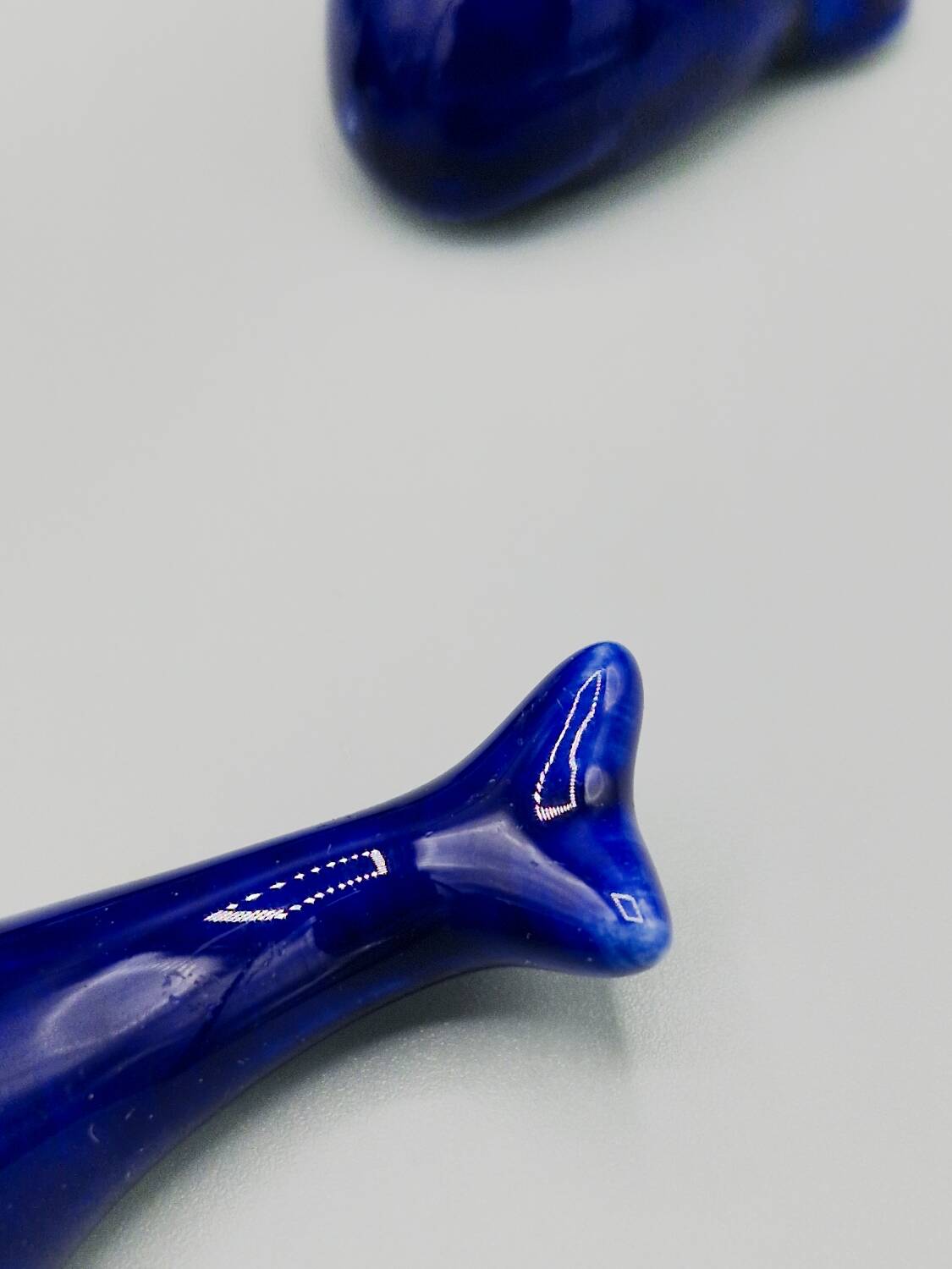 Set of 6 vintage blue porcelain whale knife rests.
