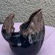 Vintage and numbered glazed ceramic decanter