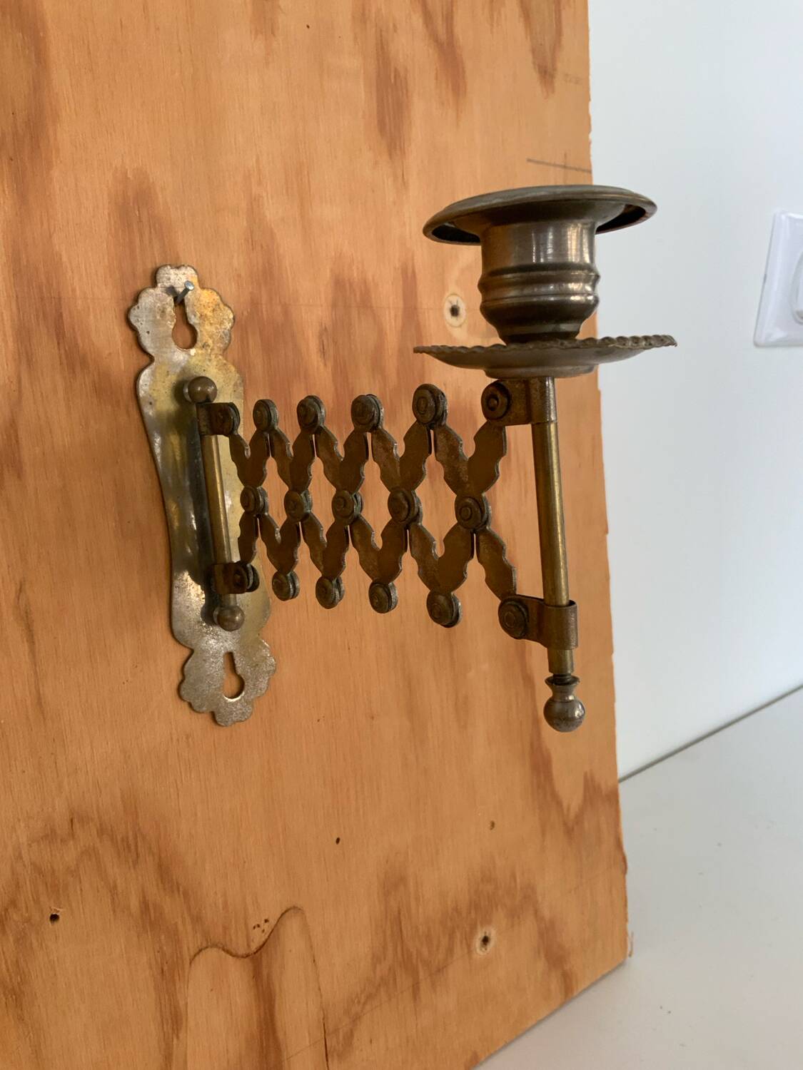 Old accordion candle holder