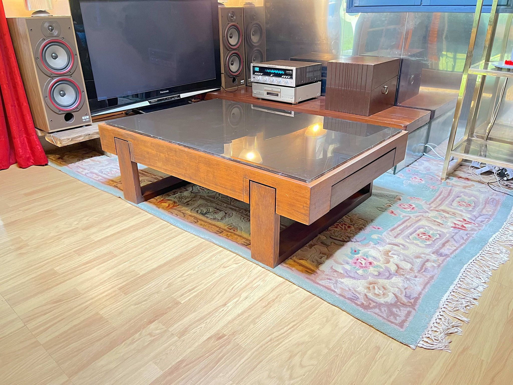 Rosewood coffee table, with black glass top, Brazil 1970