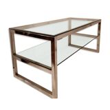 1980s coffee table with a double chrome metal top.