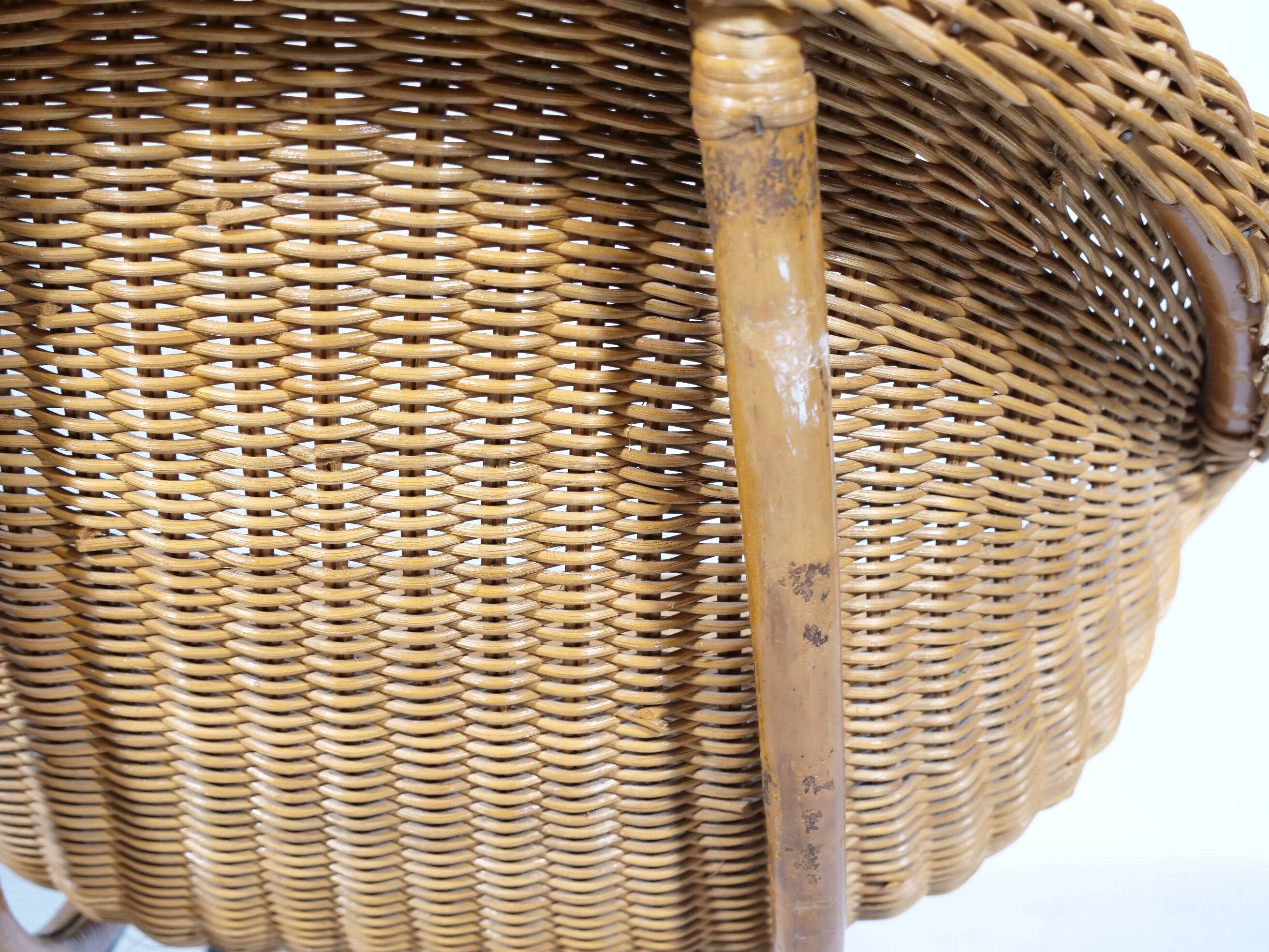 Woven rattan armchair from the 1960s