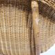 Woven rattan armchair from the 1960s