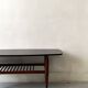 Danish teak coffee table with a double top, 1950s design.