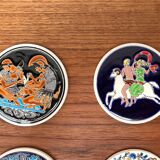 Set of 13 vintage ceramic coasters handmade by Lito Niarchos.