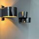 Pair of vintage wall lights, curved chrome metal, France 1970
