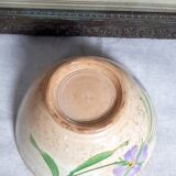 Old bowl in earthenware with floral decoration.